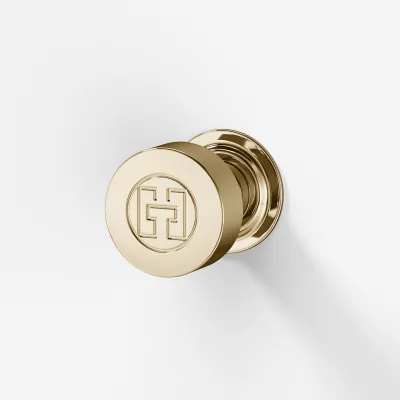 Hassel&Teudt HKN01L - Møbelgreb med H&T logo, Poleret Messing Natur